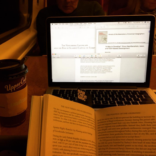 Abdulla works on his assignment on the train - Instagram photo